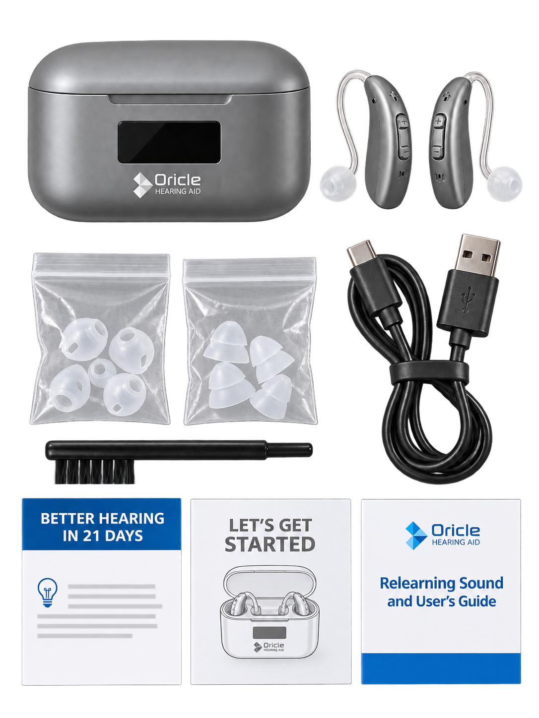 The kit laid out flat: charging case, two hearing aids, ear tips, cleaning brush, USB cable, and printed guides